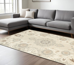 Homeroots 4' Sand Wool Floral Hand Tufted Area Rug - Elevate Your Living Space With Elegant Design And Comfort 8' X 10' Wool 576207