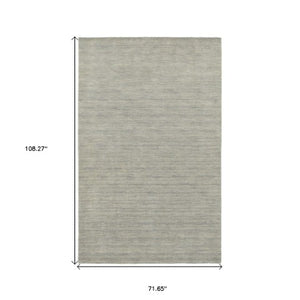 Homeroots 5' Navy Blue Wool Hand Tufted Area Rug - Elevate Your Space With Style, Comfort, And Versatility! 6' X 9' Wool 576226