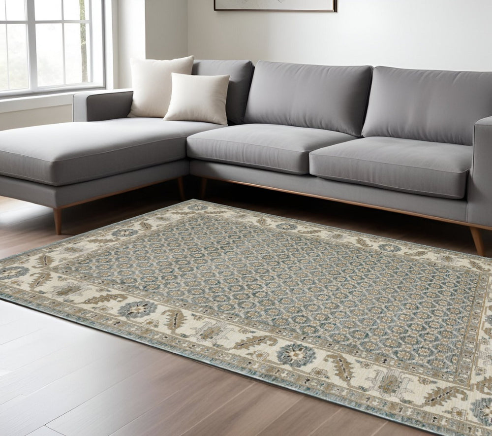 HomeRoots 3' Timeless Blue and Ivory Oriental Area Rug - Durable, Stain-Resistant Design for Home Elegance 7' X 10' 576270