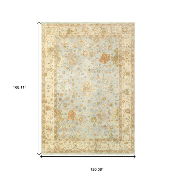 HomeRoots 6' Hand-Knotted Wool Oriental Area Rug in Blue and Sand - Durable, Timeless Design for Any Space 10' X 14' 576361
