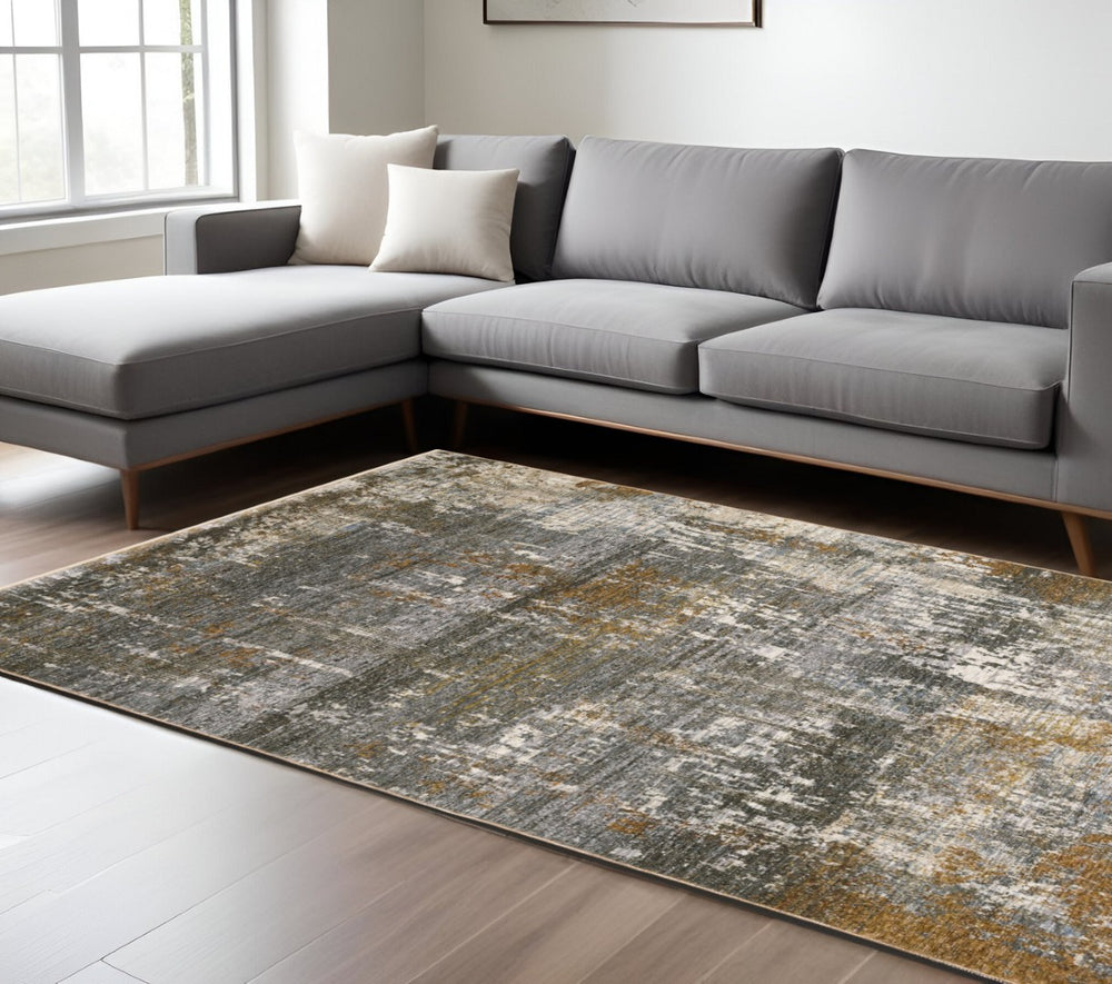 HomeRoots 3' Gray and Gold Abstract Area Rug – Modern Elegance with Tasseled Fringe for Any Room Décor 10' X 13' 576400
