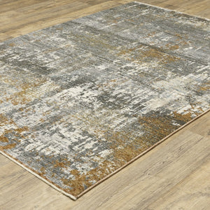 HomeRoots 3' Gray and Gold Abstract Area Rug – Modern Elegance with Tasseled Fringe for Any Room Décor 10' X 13' 576400
