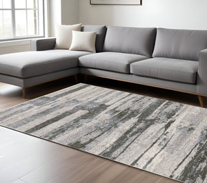 Homeroots 3' Gray Abstract Power Loom Area Rug With Fringe - Stylish, Stain-resistant Design For Any Decor 10' X 13' Polyester 576401