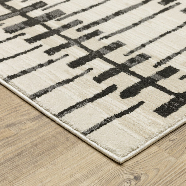Homeroots 3' Inviting Beige And Black Geometric Area Rug – Stain Resistant, Perfect For Kids And Pets! 10' X 13' Polypropylene,Polyester 576437