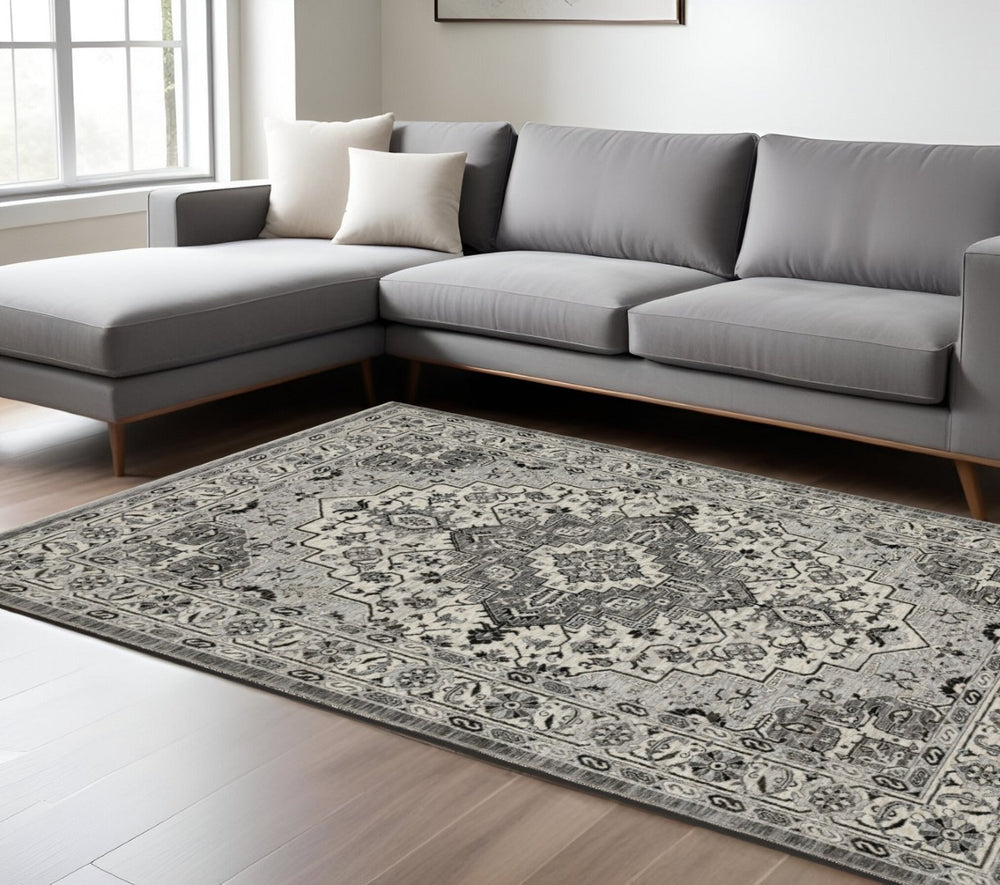 HomeRoots 3' Gray and Ivory Medallion Area Rug with Fringed Edges - Durable, Stain-Resistant for Timeless Style 10' X 13' 576453