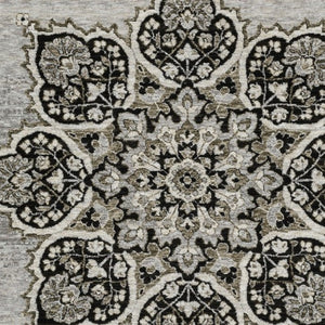 HomeRoots 3' Gray and Black Medallion Area Rug with Fringe - Timeless Design for Elegant and Cozy Spaces 10' X 13' 576463