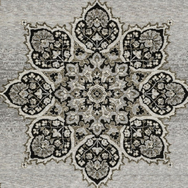 HomeRoots 3' Gray and Black Medallion Area Rug with Fringe - Timeless Design for Elegant and Cozy Spaces 8' X 11' 576464