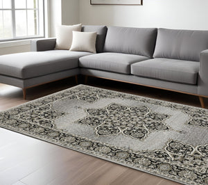 HomeRoots 3' Gray and Black Medallion Area Rug with Fringe - Timeless Design for Elegant and Cozy Spaces 8' X 11' 576464