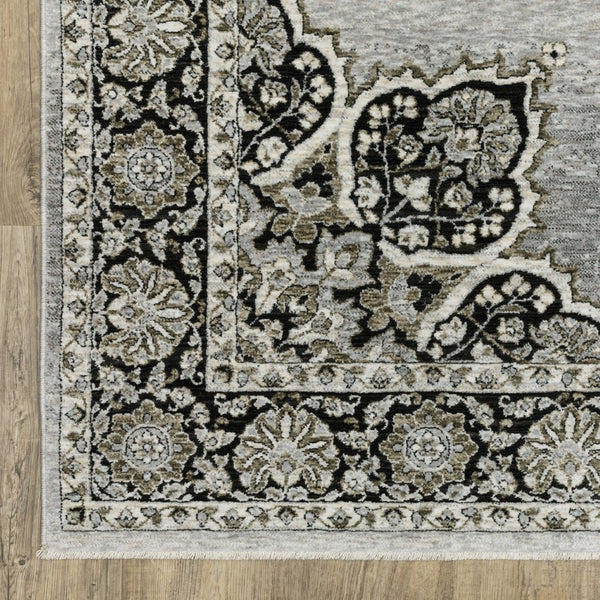 HomeRoots 3' Gray and Black Medallion Area Rug with Fringe - Timeless Design for Elegant and Cozy Spaces 8' X 11' 576464
