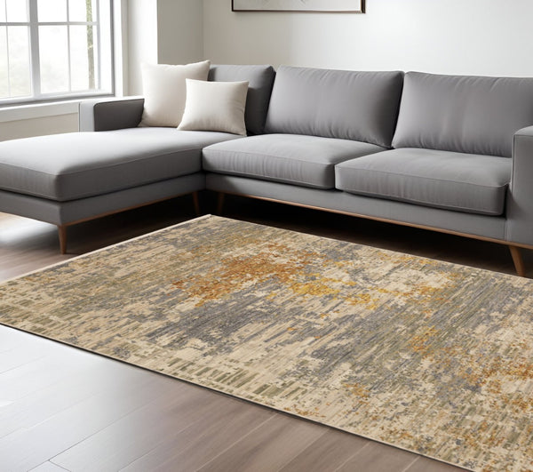 HomeRoots 3' Elevate Your Home Aesthetic with a Beige and Gold Abstract Area Rug Featuring Elegant Fringe 10' X 13' 576469
