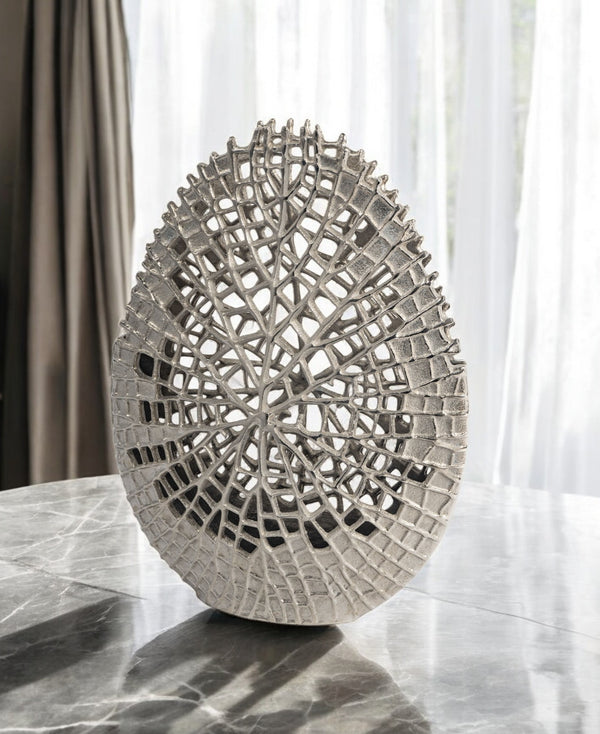 Homeroots 14" Silver Pierced Aluminum Table Vase - Modern Abstract Design For Chic Home Decor & Floral Arrangements  Aluminum 576760