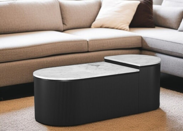 HomeRoots Set of Two Modern Black and White Oval Drum Coffee Tables with Faux Marble Tops for Living Rooms 576838