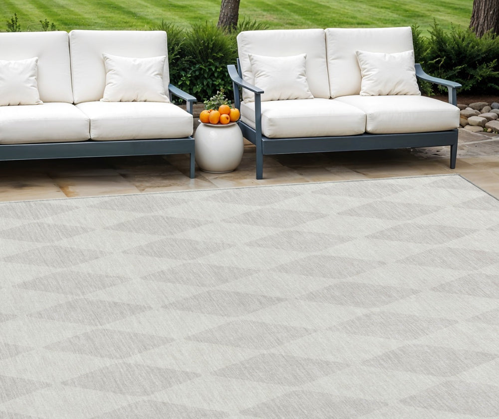 HomeRoots 9' Stylish Ivory and Beige Geometric Area Rug - Durable, Washable, Indoor/Outdoor Versatile Design 9' X 12' 577059