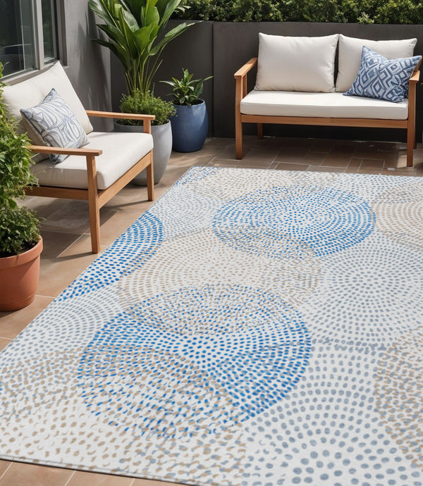 Homeroots 3' Stylish Ivory Blue And Taupe Polka Dot Washable Area Rug For Indoor And Outdoor Spaces 5' X 8' Polyester 577356