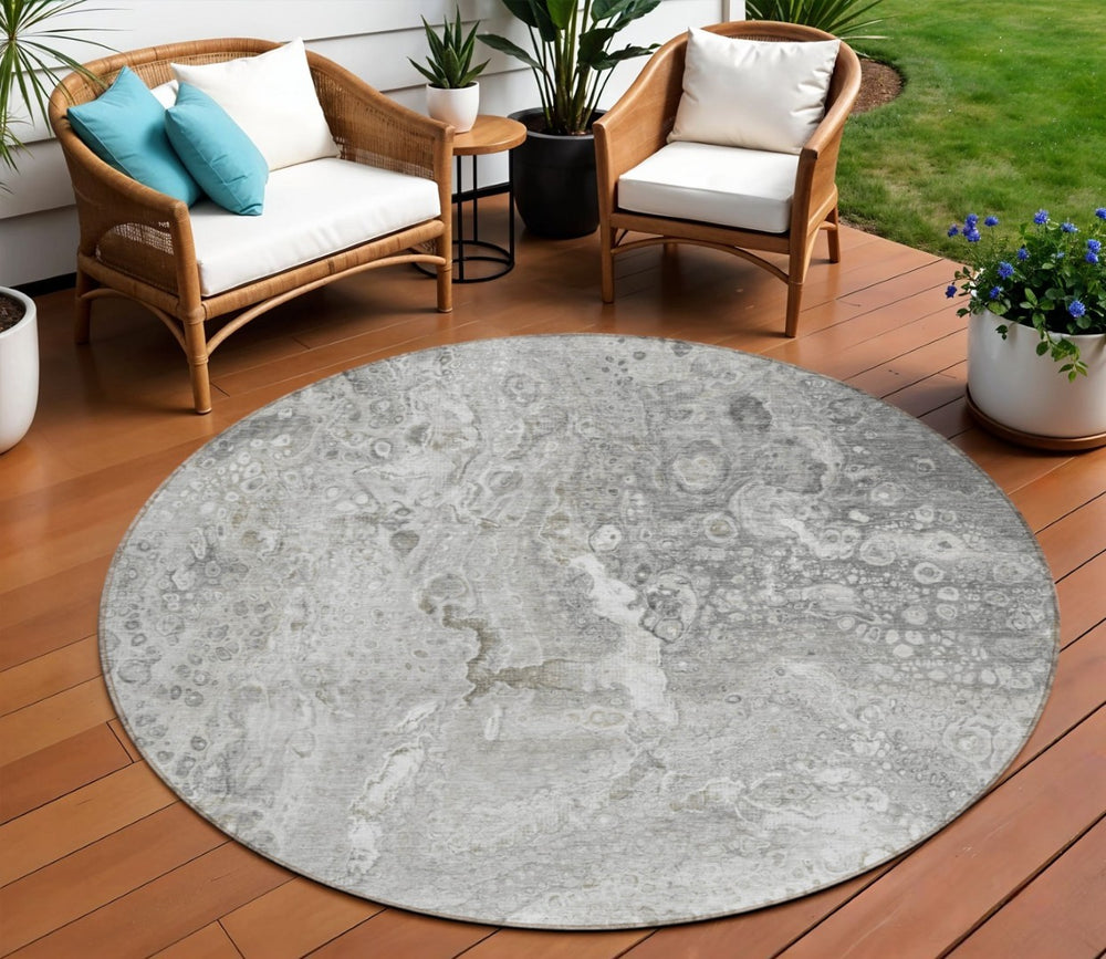 HomeRoots 5' Silver Gray and Taupe Abstract Area Rug - Stylish, Washable, Durable for Indoor and Outdoor Use 8' Round 577423