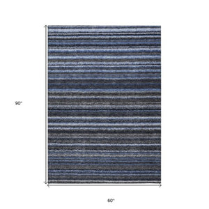 Homeroots 3' Denim Blue And Gray Striped Washable Area Rug For Indoor And Outdoor Use – Durable & Stylish! 5' X 8' Polyester 577764
