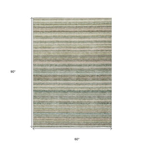 Homeroots 3' Denim Blue And Gray Striped Washable Area Rug For Indoor And Outdoor Use – Durable & Stylish! 5' X 8' Polyester 577800