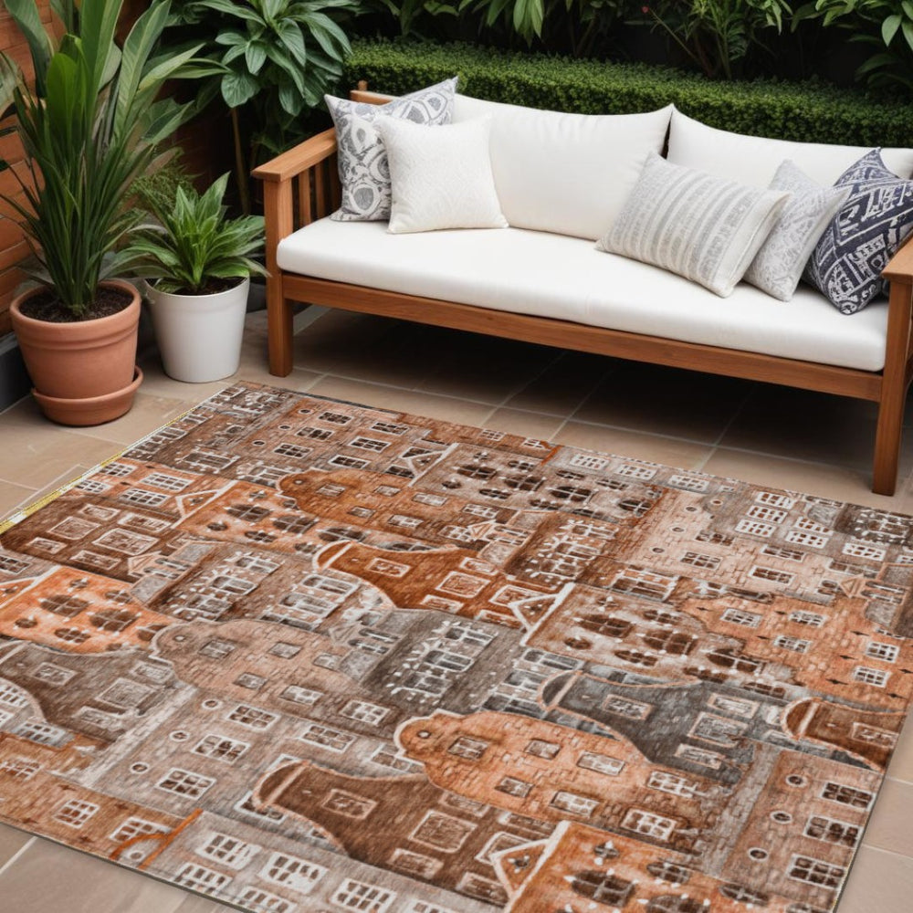 HomeRoots 9' Vibrant Orange Copper and Salmon Village Houses Area Rug for Indoor and Outdoor Spaces 9' X 12' 577869
