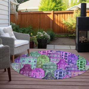 HomeRoots 5' Vibrant Purple Lilac and Green Village Houses Washable Area Rug for Indoor and Outdoor Spaces 8' Round 577873