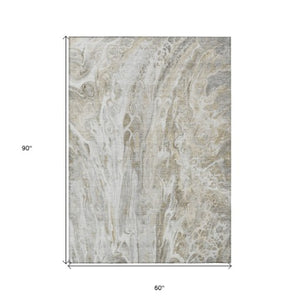 Homeroots 3' Denim Blue And Navy Abstract Washable Area Rug - Versatile Indoor Outdoor Décor For Any Space 5' X 8' Polyester 577945