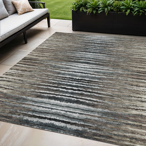 Homeroots 3' Beige Tan And Taupe Striped Washable Area Rug - Stylish Indoor Outdoor Décor For Any Space 5' X 8' Polyester 577987