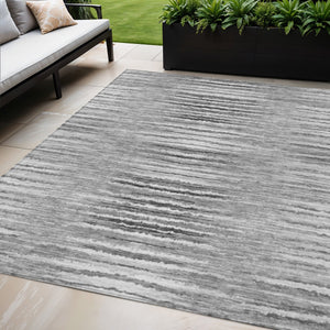 Homeroots 3' Beige Tan And Taupe Striped Washable Area Rug - Stylish Indoor Outdoor Décor For Any Space 5' X 8' Polyester 577999