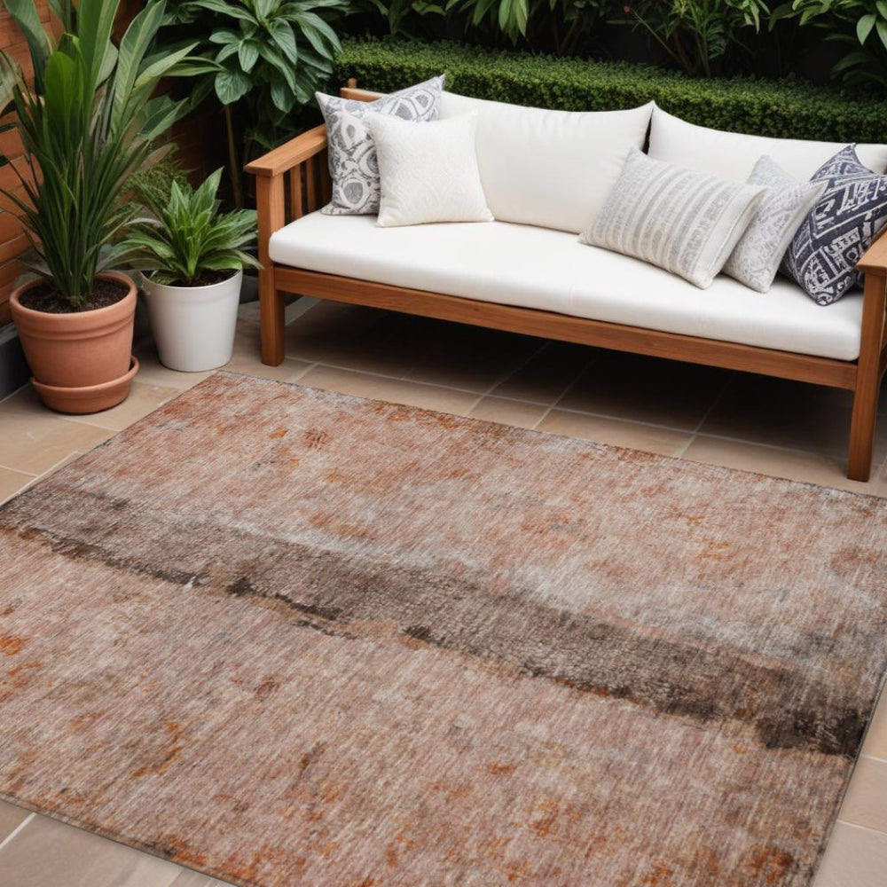 HomeRoots 9' Vibrant Abstract Area Rug in Orange, Peach & Brown - Washable, Durable, Perfect for Indoors & Outdoors 9' X 12' 578044