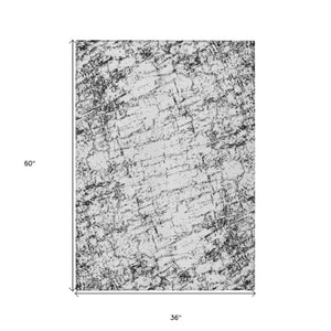 Homeroots 3' Stylish Black, White & Gray Abstract Washable Area Rug For Indoor & Outdoor Spaces 3' X 5' Polyester 578064