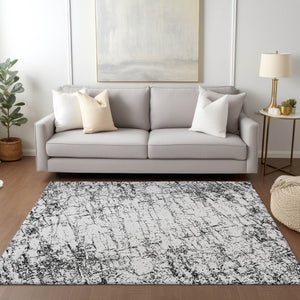Homeroots 3' Stylish Black, White & Gray Abstract Washable Area Rug For Indoor & Outdoor Spaces 5' X 8' Polyester 578065