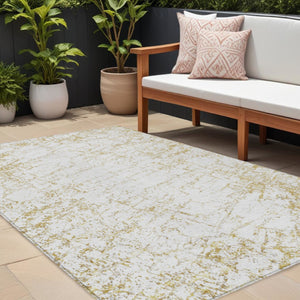 HomeRoots 5' Gold and Ivory Abstract Area Rug - Stylish, Washable, Durable for Indoor and Outdoor Spaces 8' X 10' 578073