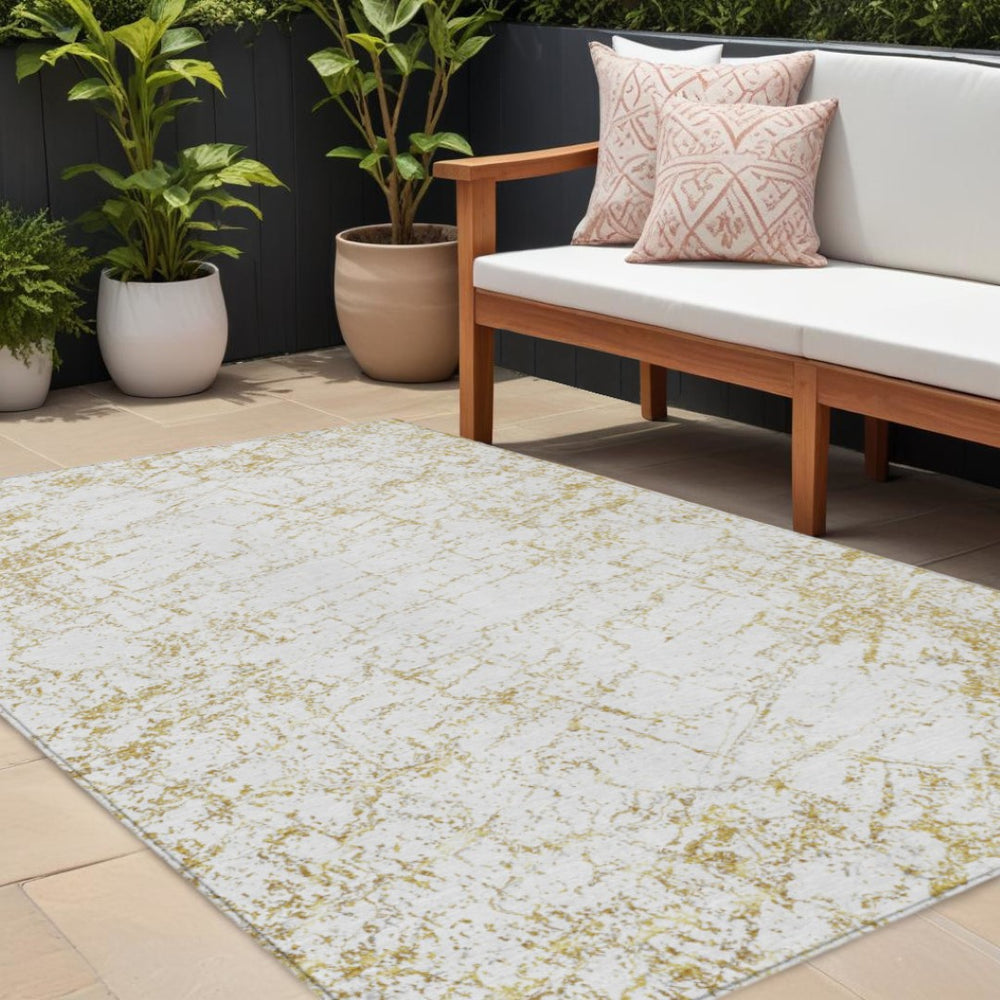 HomeRoots 9' Gold and Ivory Abstract Washable Area Rug - Durable, Stylish, Perfect for Indoor and Outdoor Spaces 9' X 12' 578074