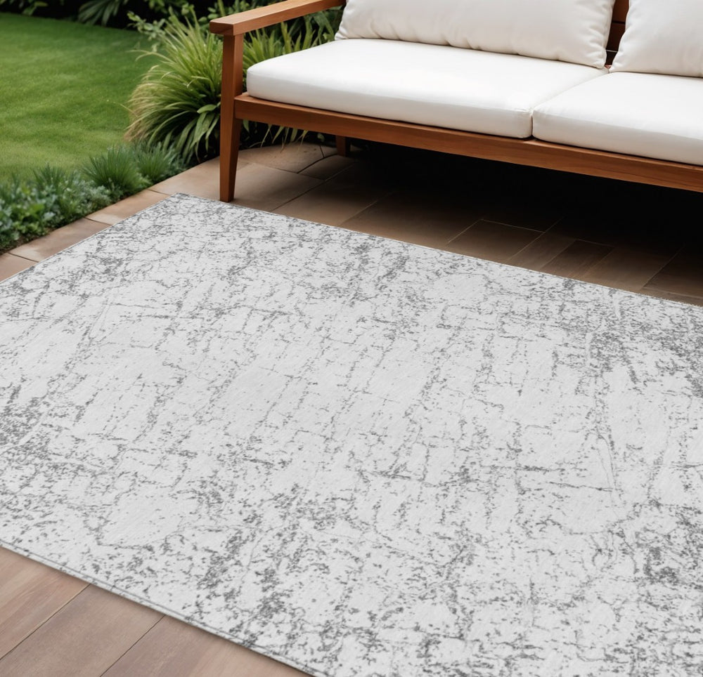 HomeRoots 5' Gray and Ivory Abstract Area Rug - Stylish, Washable, Durable for Indoor and Outdoor Spaces 10' X 14' 578081