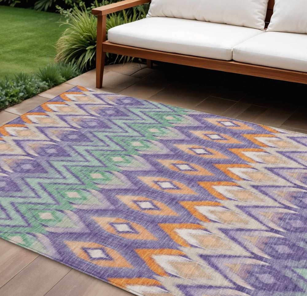 HomeRoots 5' Vibrant Southwestern Area Rug in Purple-Lilac and Orange - Washable, Durable, Indoor/Outdoor Style 10' X 14' 578483