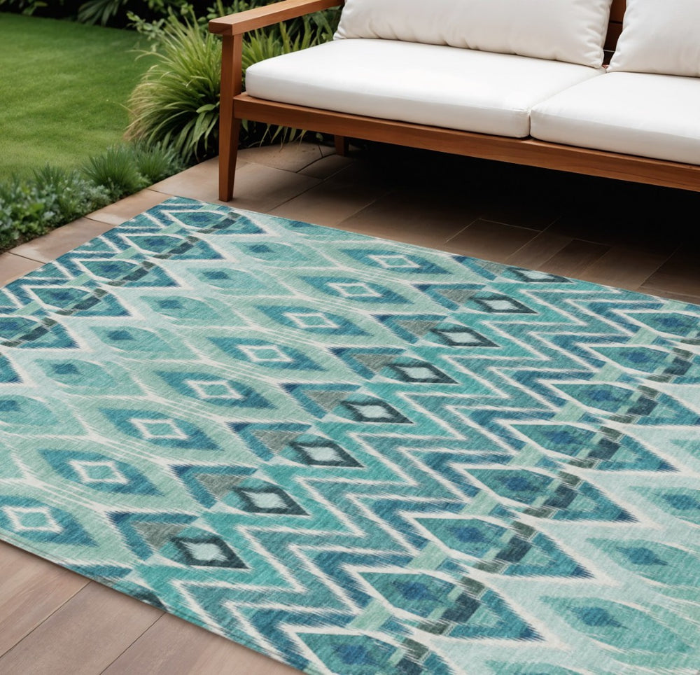HomeRoots 5' Vibrant Teal Blue Aqua Mint Green Southwestern Washable Area Rug for Indoor Outdoor Spaces 10' X 14' 578495