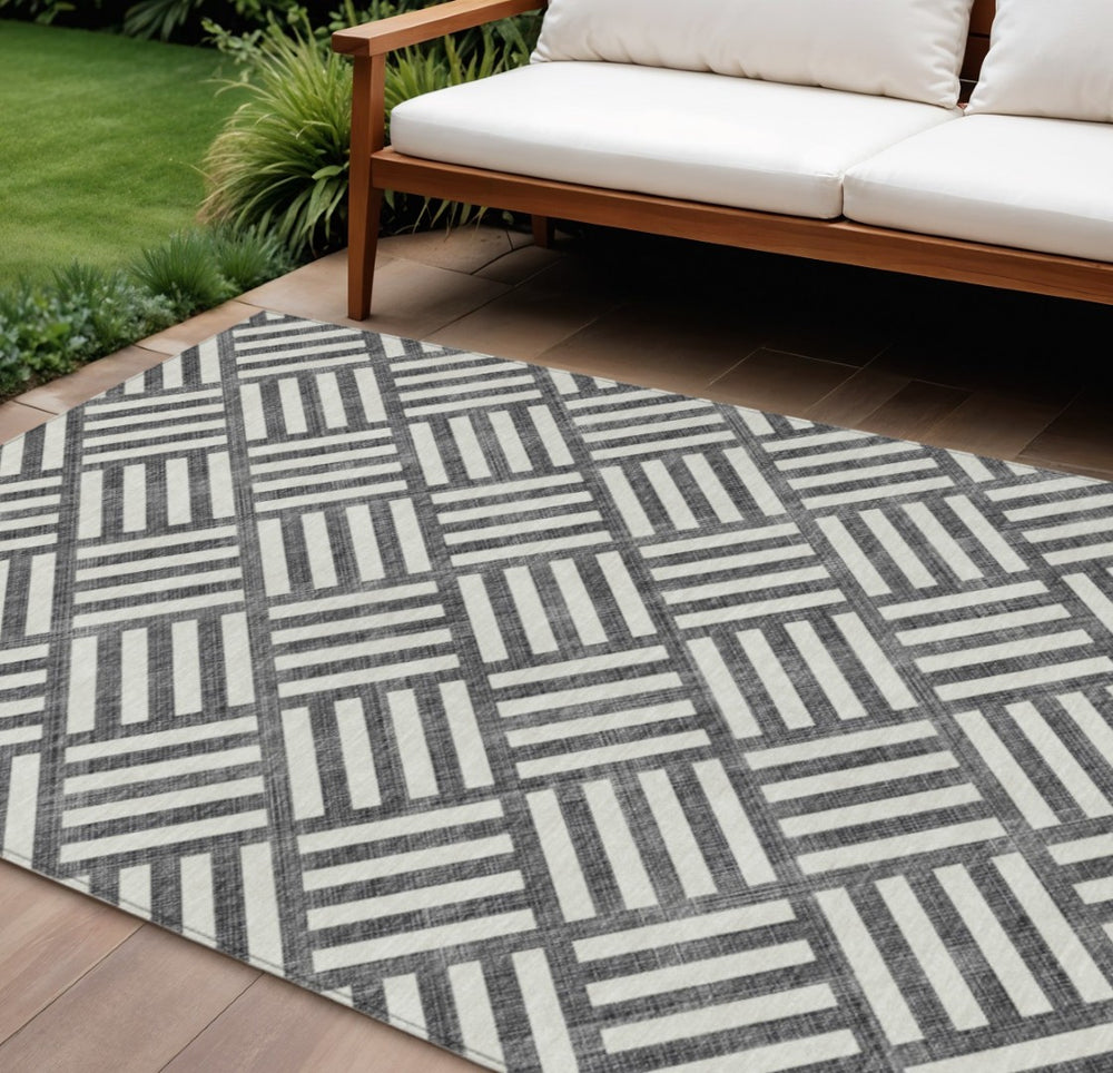HomeRoots 9' Black and Ivory Geometric Washable Area Rug for Indoor and Outdoor Use - Modern Style & Easy Care 9' X 12' 578716