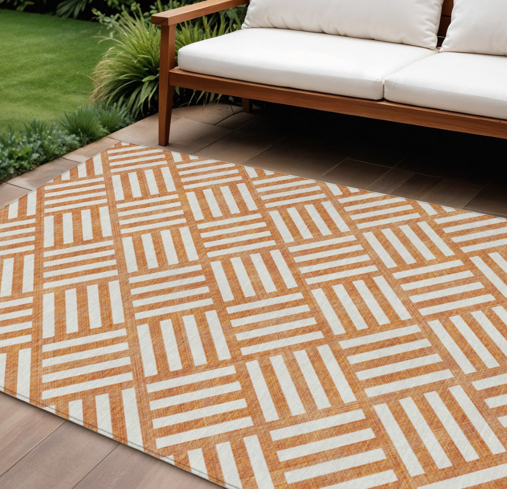 HomeRoots 9' Orange and Ivory Geometric Area Rug – Stylish, Washable, Durable for Indoor and Outdoor Spaces 9' X 12' 578788