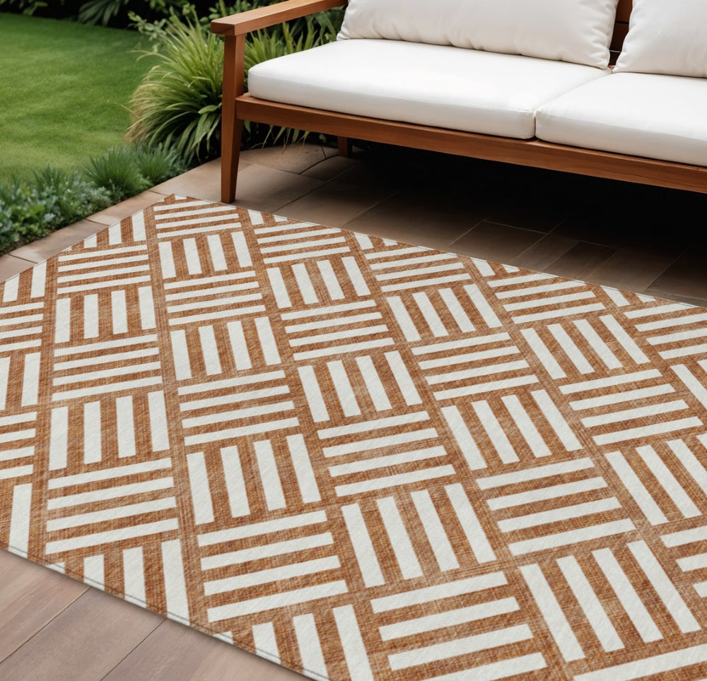 HomeRoots 5' Orange and Ivory Geometric Area Rug – Washable, Durable, Stylish for Indoor and Outdoor Spaces 10' X 14' 578795