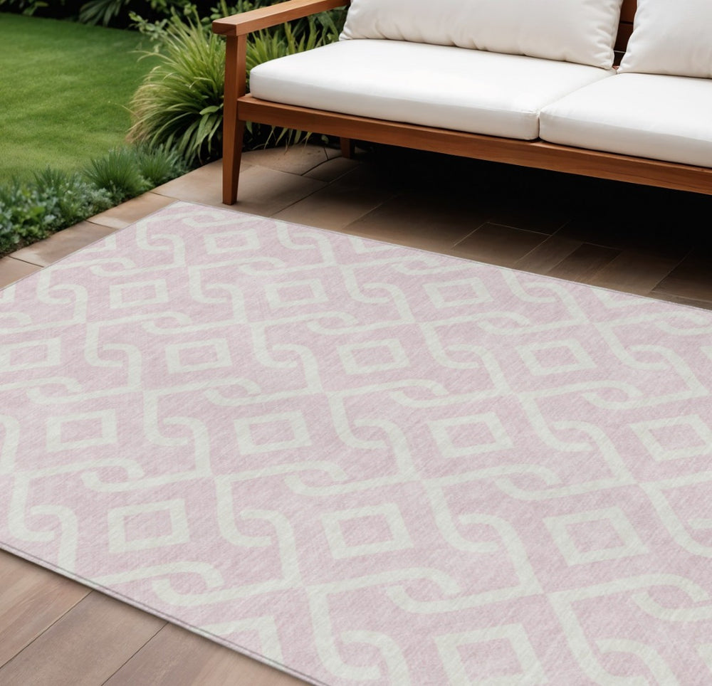 HomeRoots 9' Modern Pink and Ivory Geometric Washable Area Rug – Versatile Indoor Outdoor Decor for Any Space 9' X 12' 578944