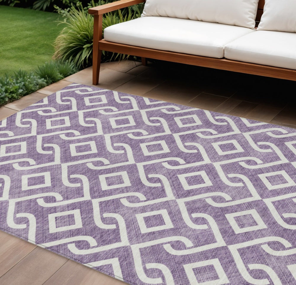 HomeRoots 5' Bold Purple and Ivory Geometric Area Rug – Stylish, Washable, Indoor/Outdoor Durable Design 8' X 10' 578949