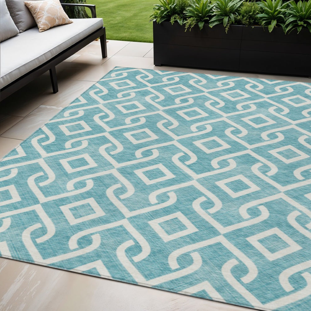 HomeRoots 5' Teal Blue and Ivory Geometric Area Rug – Durable, Washable Design for Indoor and Outdoor Spaces 5' X 8' 578983