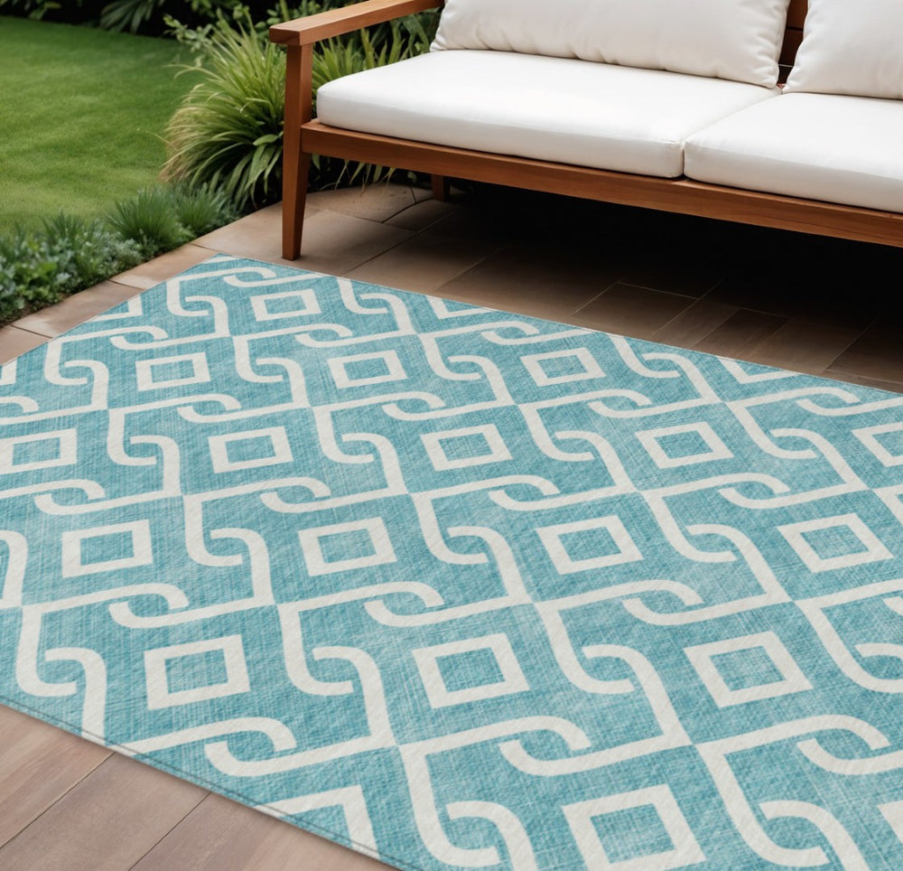 HomeRoots 9' Teal Blue and Ivory Geometric Indoor Outdoor Area Rug – Durable, Washable, and Stylish Design 9' X 12' 578986