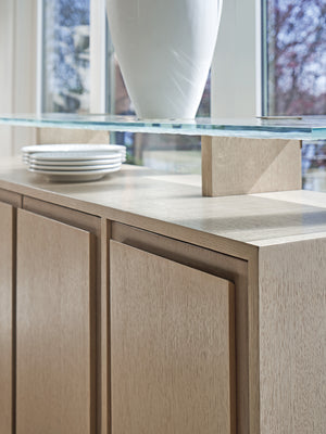 Lexington Tommy Bahama Home Callum Buffet - Contemporary Sand Drift Finish With Wavy Glass Shelf, Adjustable Storage & Soft-close Drawer Sand Drift  578-852