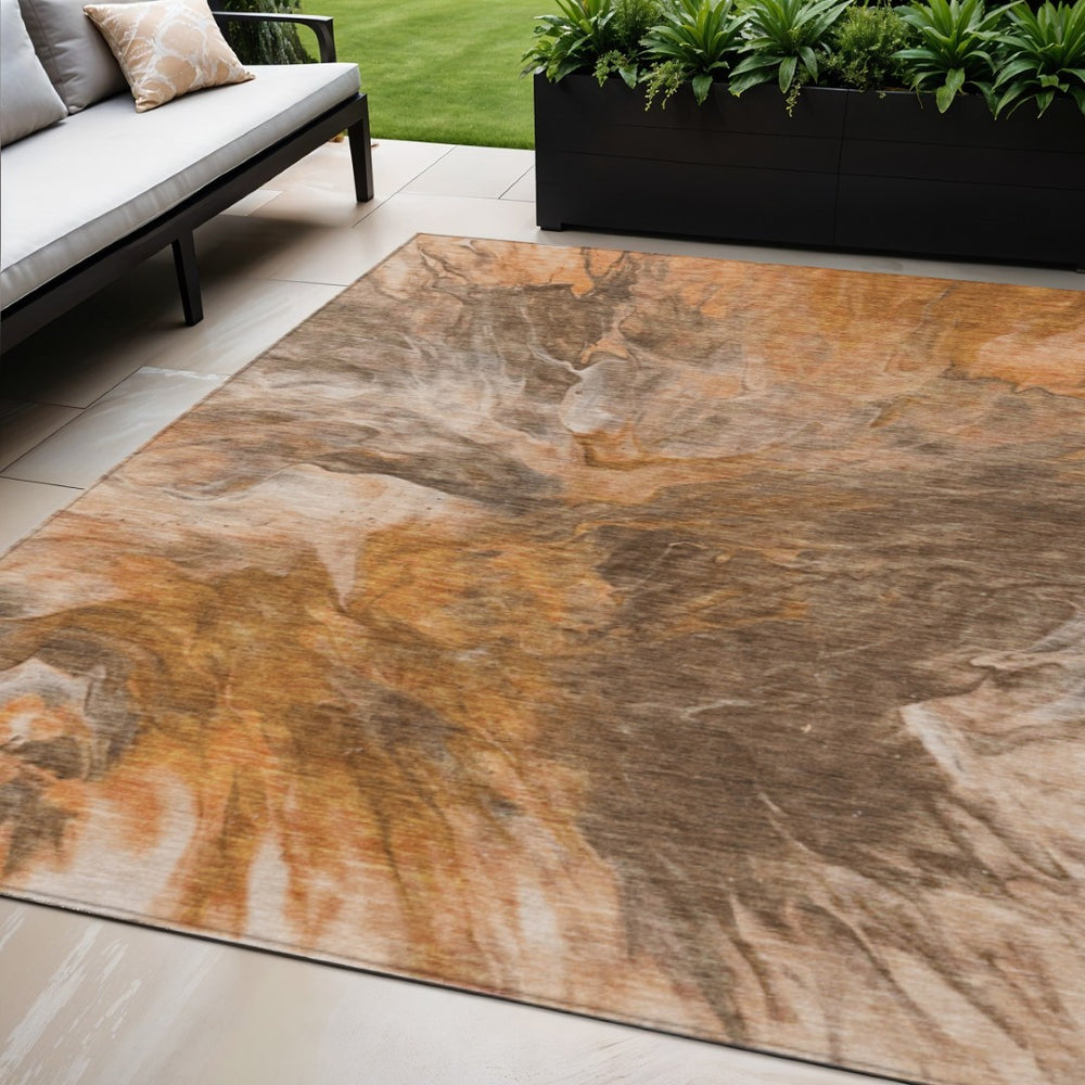 HomeRoots 5' Vibrant Orange and Copper Abstract Washable Area Rug for Indoor and Outdoor High-Traffic Spaces 5' X 8' 579728