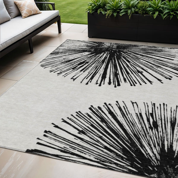 HomeRoots 5' Durable Black and Ivory Abstract Area Rug - Washable, Stain-Resistant for Indoor and Outdoor Use 5' X 8' 579758