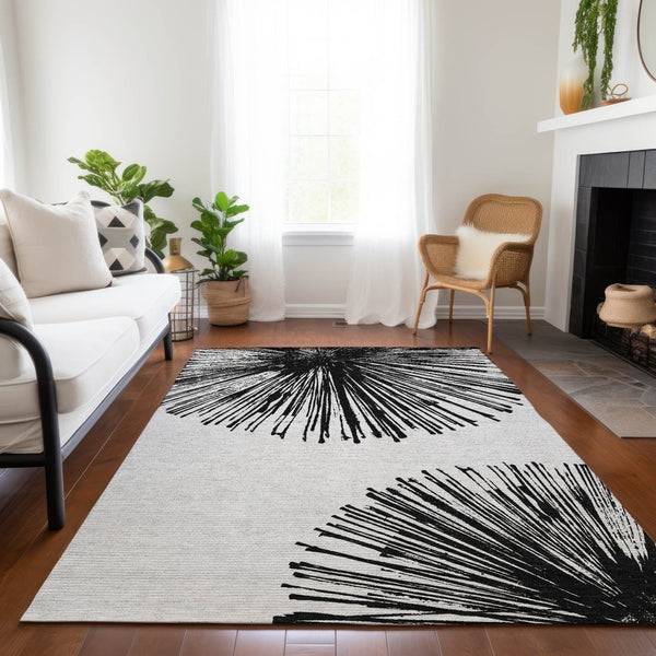 HomeRoots 5' Durable Black and Ivory Abstract Area Rug - Washable, Stain-Resistant for Indoor and Outdoor Use 5' X 8' 579758