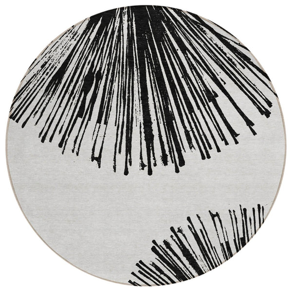 HomeRoots 8' Black and Ivory Round Abstract Indoor Outdoor Area Rug – Stylish, Washable, Durable Décor Solution 8' Round 579759