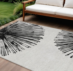 HomeRoots 5' Durable Black and Ivory Abstract Area Rug - Washable, Stain-Resistant for Indoor and Outdoor Use 8' X 10' 579760