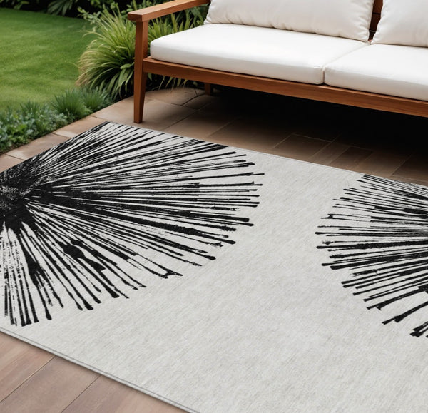 HomeRoots 5' Durable Black and Ivory Abstract Area Rug - Washable, Stain-Resistant for Indoor and Outdoor Use 8' X 10' 579760