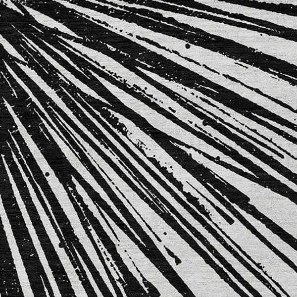 HomeRoots 5' Durable Black and Ivory Abstract Area Rug - Washable, Stain-Resistant for Indoor and Outdoor Use 8' X 10' 579760