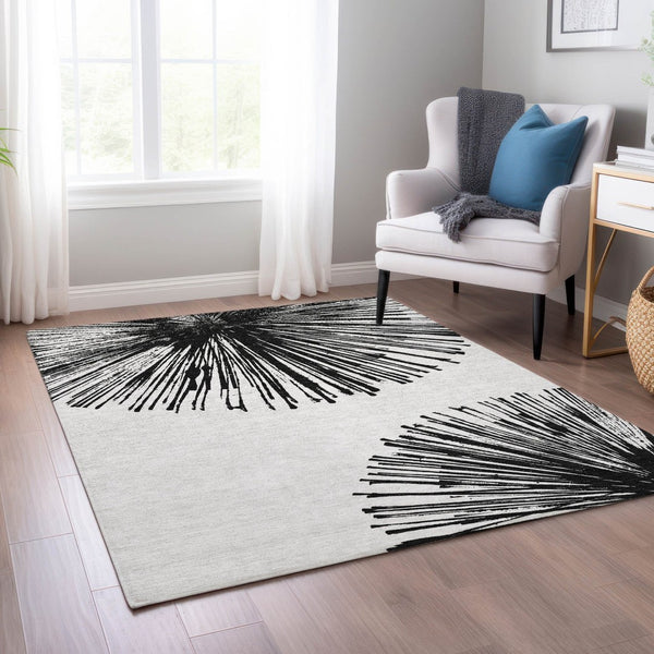 HomeRoots 5' Durable Black and Ivory Abstract Area Rug - Washable, Stain-Resistant for Indoor and Outdoor Use 8' X 10' 579760